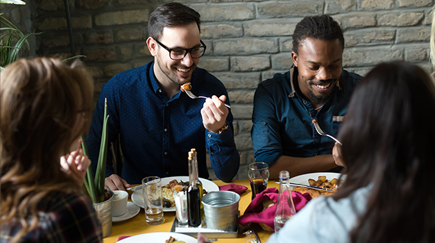 friends eating out together