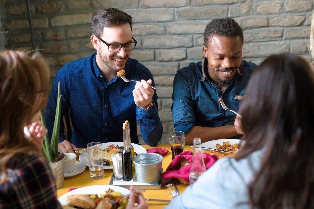 Friends eating out together